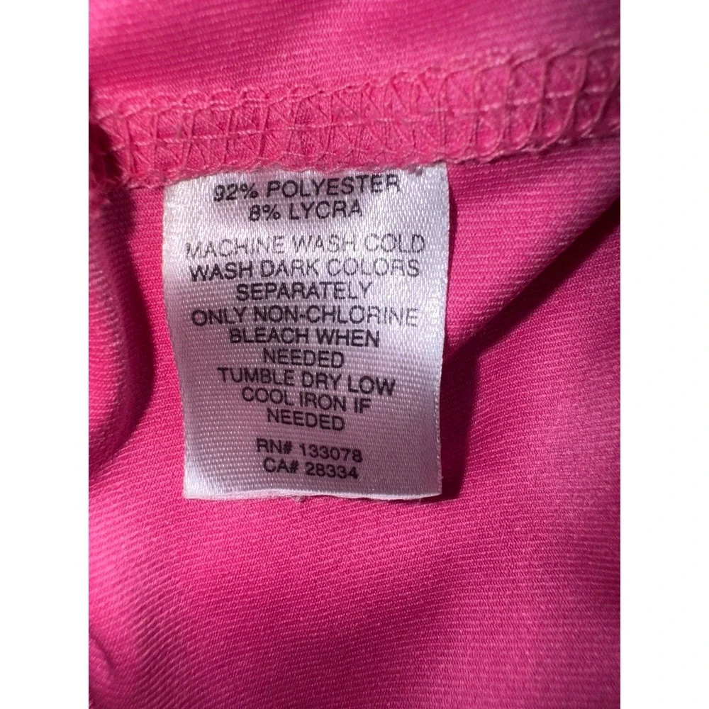Lucky In Love pink ruffled‎ skort with undershorts and a 4